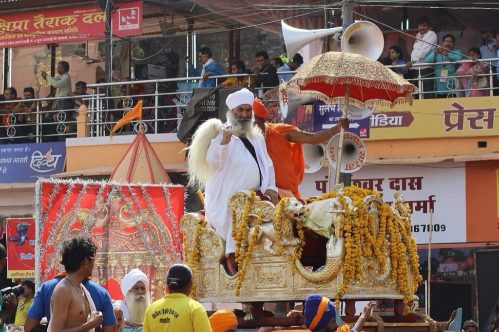 A decorated silver chariot under a ceremonial umbrella in the Shahi Snan procession of the Panchayati Akhara Nirmal at the 2016 Simhastha, Ujjain