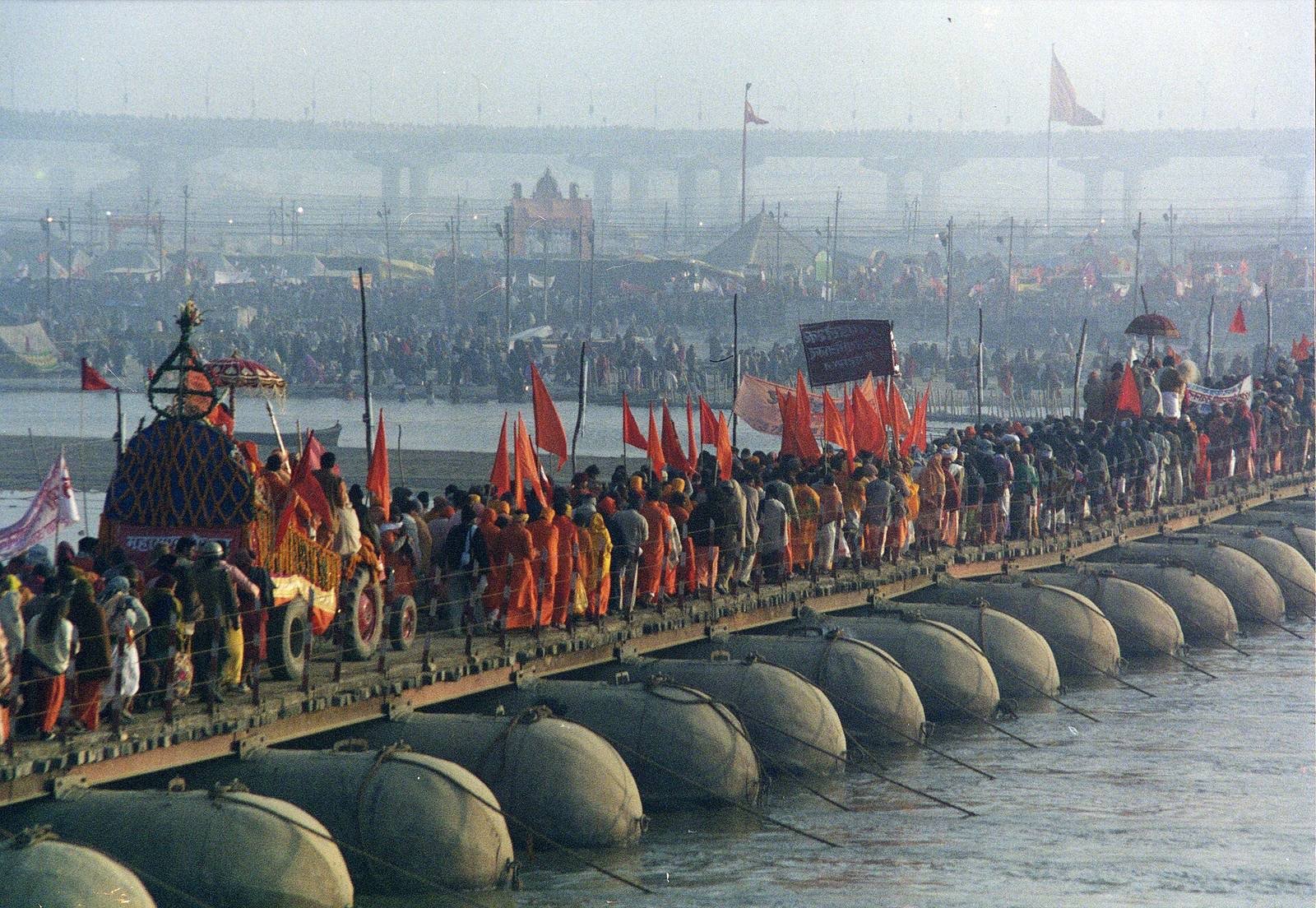A procession crossing a pontoon bridge at the 2001 Kumbh Mela